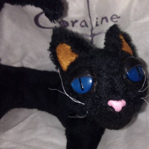 Coraline cat plush toy