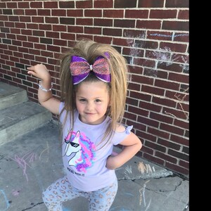 Beehive Cheer Hair ponytail for cheer competitions