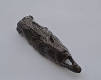 African mask, polymer clay to create pieces