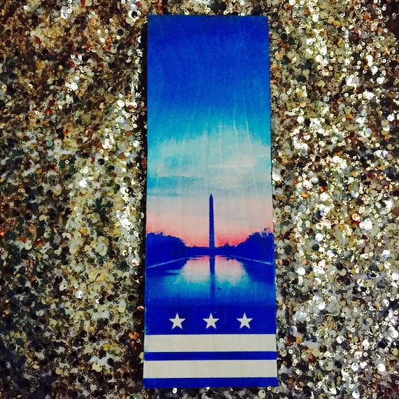 Washington Monument with the DC Flag