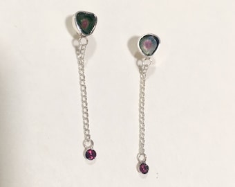 Watermelon Tourmaline dangling a Garnet
