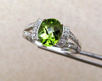 Elegant Genuine Peridot Checkerboard Oval in Sterling Accented Ring