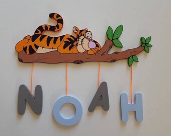 Door with hanging name plaque