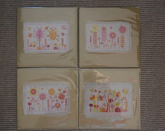 Four garden design fabric cards