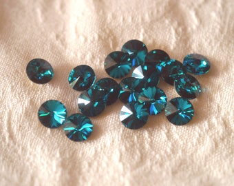12 pieces 1122 Blue Zircon 8mm (39ss) Swarovski Crystal Rivolis