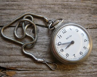 ca. 1970 westclox BULLSEYE POCKET WATCH with chain. Runs and keeps time!