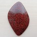 Analcimolite free form cabochon