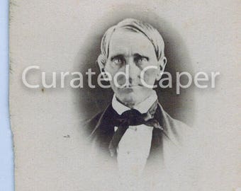 Original vintage photograph of a man with white vignette