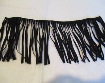fringed black leather strap