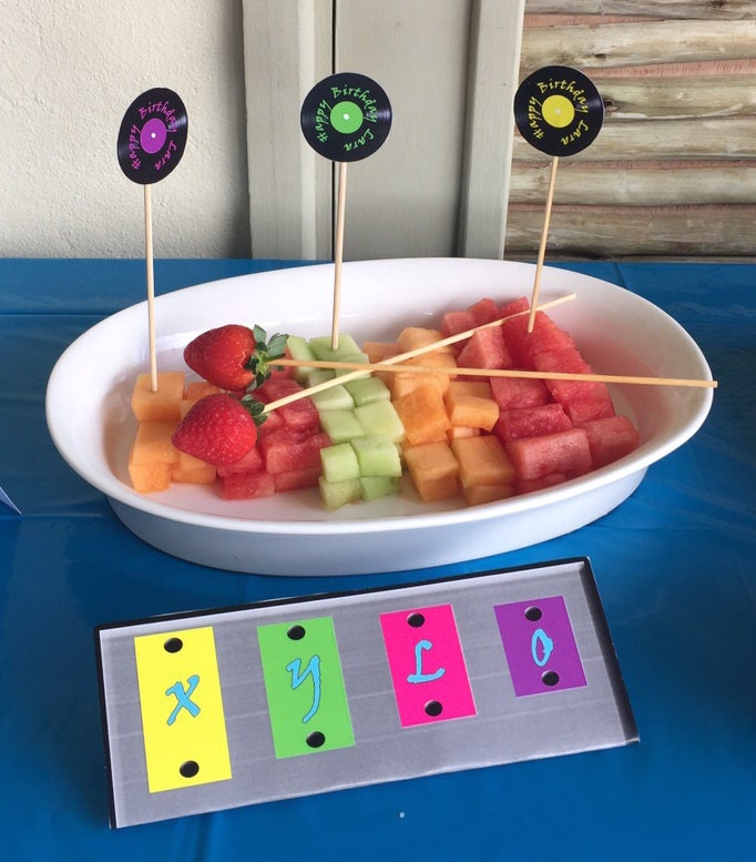 Music themed birthday party table decorations food labels