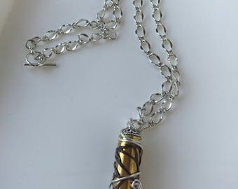Filigree Covered Bullet Casing Pendant Necklace