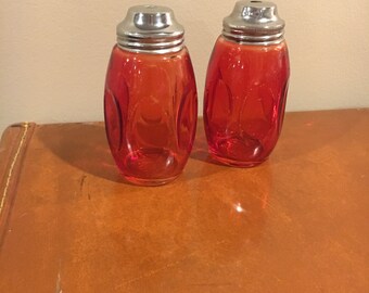 Vintage Airko red salt and pepper shakers