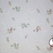 Wow! Clearance sale of sewing fabric Flowers on light ivory backround Only 3 dollar per yard, while quantities last 29" width