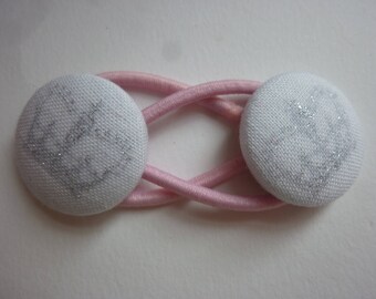 Pair small ponytails button wreaths