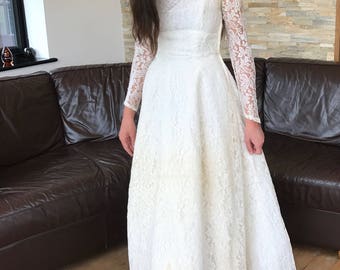 An original 1950s lace wedding gown by Mandell London Sz8