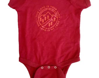 Baby This Land Onesie