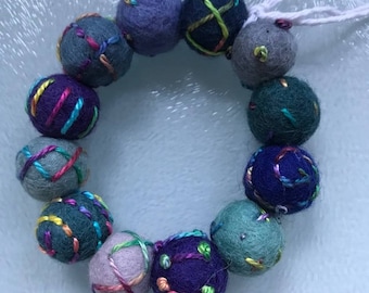 Embroidered wool felt bead bracelet