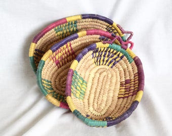 Vintage wicker baskets with hangers…wickers bowls or trays...colorful raffia baskets, bowls, trays...farmhouse chic.