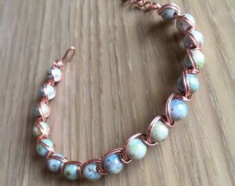 Handmade Copper Wire Bracelet with Blue Globelike Beads. Adjustable Copper Clasp.