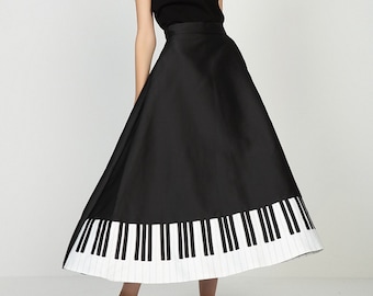 Walking in the music black and white piano elegant long skirt