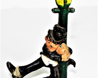 Cast Iron Drunk on Lamp Post 4 Inches