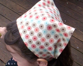 Multi Colored Sprials On Girls Head Scarf