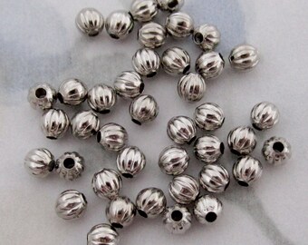 200 ps. silver tone plated fluted ridged beads 3mm - f2870