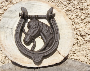 Horseshoe cast iron door knocker
