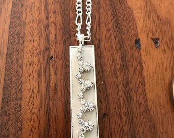 Concrete necklaces! Handmade with all media materials .