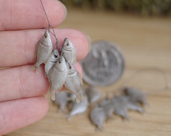 Miniature dollhouse . A bunch of fresh fish . In 1/12 scale