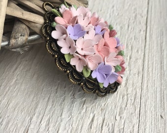 Pendant with flowers made of polymer clay Decoclay pastel