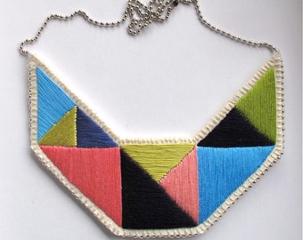Statement bib necklace hand embroidered in lime green blues and pinks hand embroidered geometric design