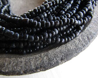 black seed beads, small matte glossy black glass beads, irregular organic tube barrel spacer Indonesia 1.5 to 4mm / 44 inch strand - 7ab2-2