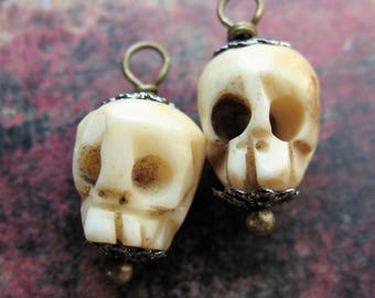 Carved Bone Skull Bead Charms - 1 pair - 18mm in length