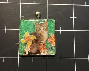 Pinwheel Kitten. 50% of the proceeds goes to the current focus charity