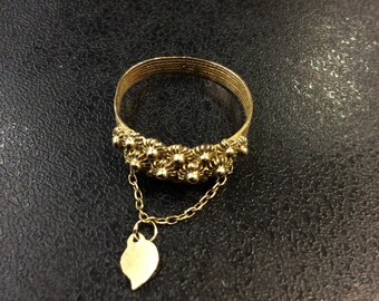 18ct gold keeper ring with drop ,tassel