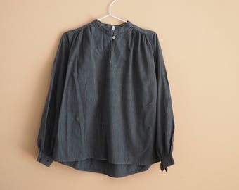 Grey blouse with delicate white stripes