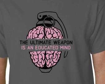The Ultimate Weapon Is An Educated Mind t-shirt // Anonymous Geek Humour Political