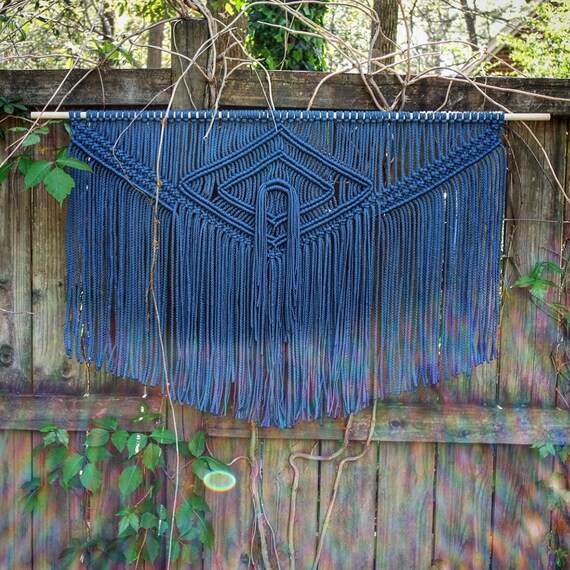 Large outdoor safe macramé wall hanging in color. Wall