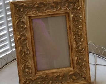 Small table top gilt frame