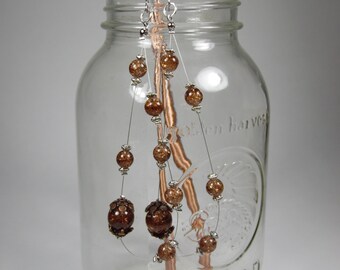 one of a kind extra long dangle hoop earring
