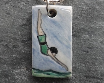 Diving Belle ceramic pendant in green