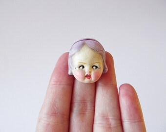 Kitsch Doll Pin Brooch Amber