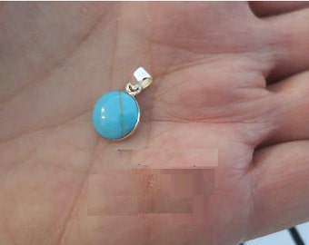 Turquoise gemstone pendant set in 92.5 sterling silver