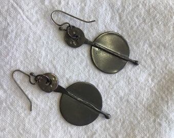 Hand forged oxidized copper earnings with up cycled washer component .