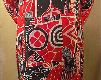 One-of-a-kind 100% up-cycled silk Holiday themed tunic with cowl neck and front pocket detail