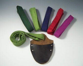 One Leather Sheath and Strap