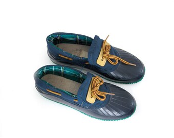 Vintage duck shoes. Rubber duck boots. Lace up. Green and blue. Women’s duck boots size 6. Made in Canada.
