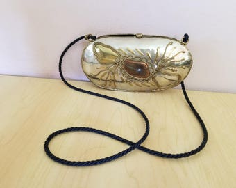 Women vintage handmade metal purse on string