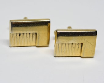 Gold tone cuff links